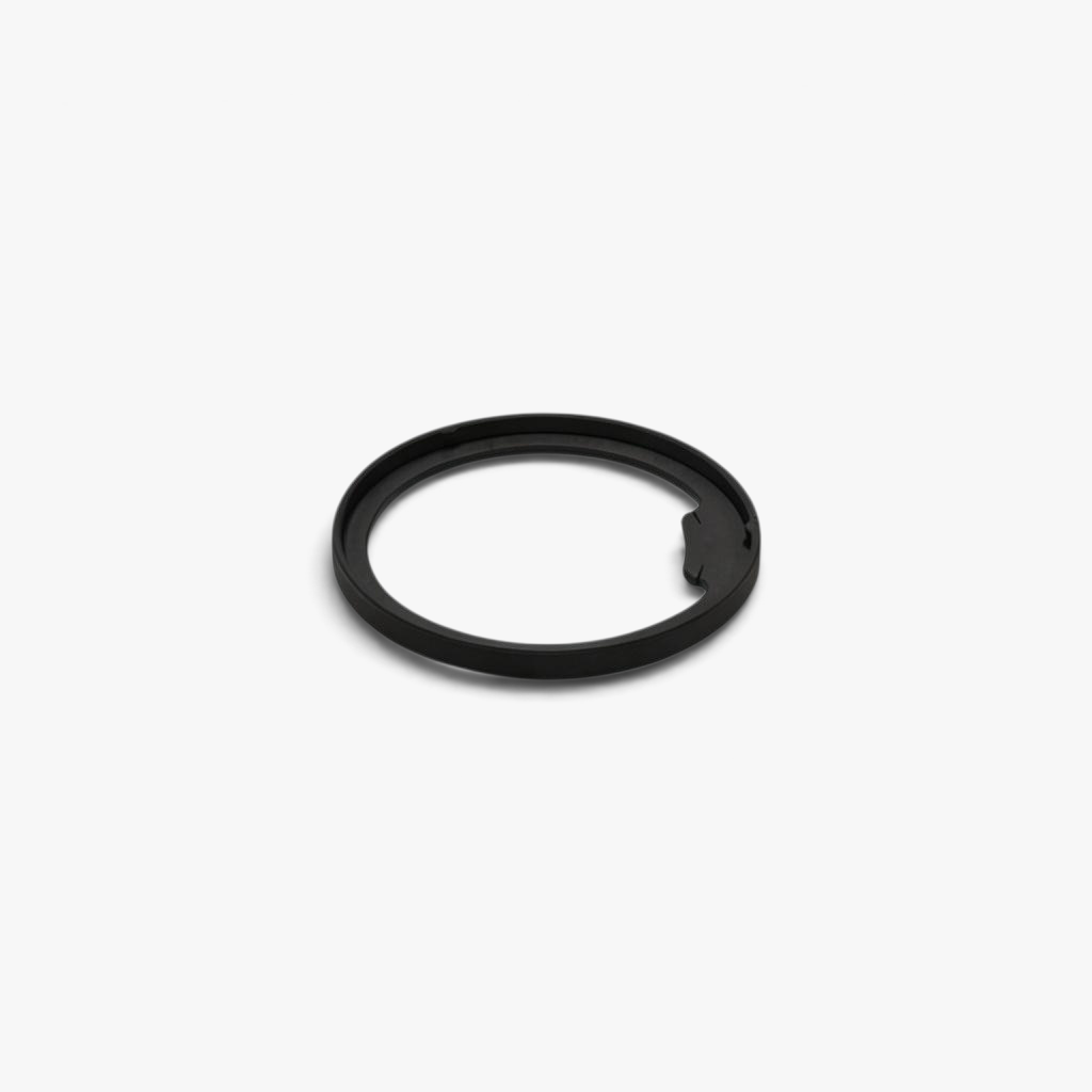 FŪTL Spool Savers black plastic ring for reinforcing industrial thread spools with an integrated tangle tab