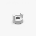 White FŪTL Bobbin Top accessory designed to hold a bobbin on top of industrial sewing thread spool.