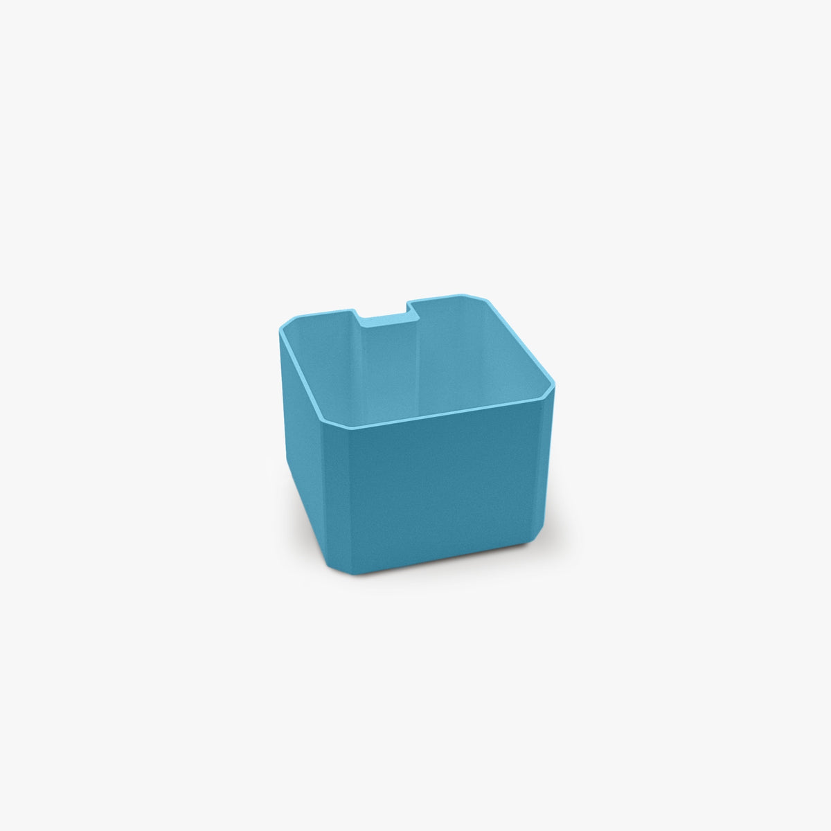 FŪTL square table caddy in bright blue for organizing craft tools and accessories on a desk edge